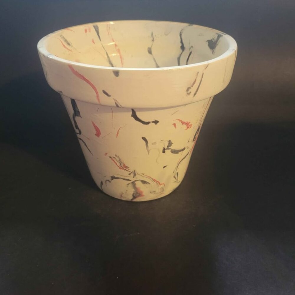 Hand-Painted Terracotta Plant Pot With a White Base And Black And Pink Accents